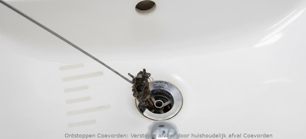 Verstopte afvoer door huishoudelijk afval Coevorden